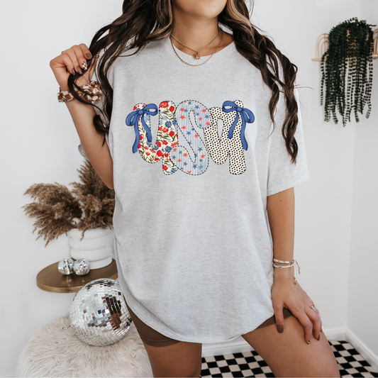 floral polka dot ,star letter design USA tee with bows on letters.