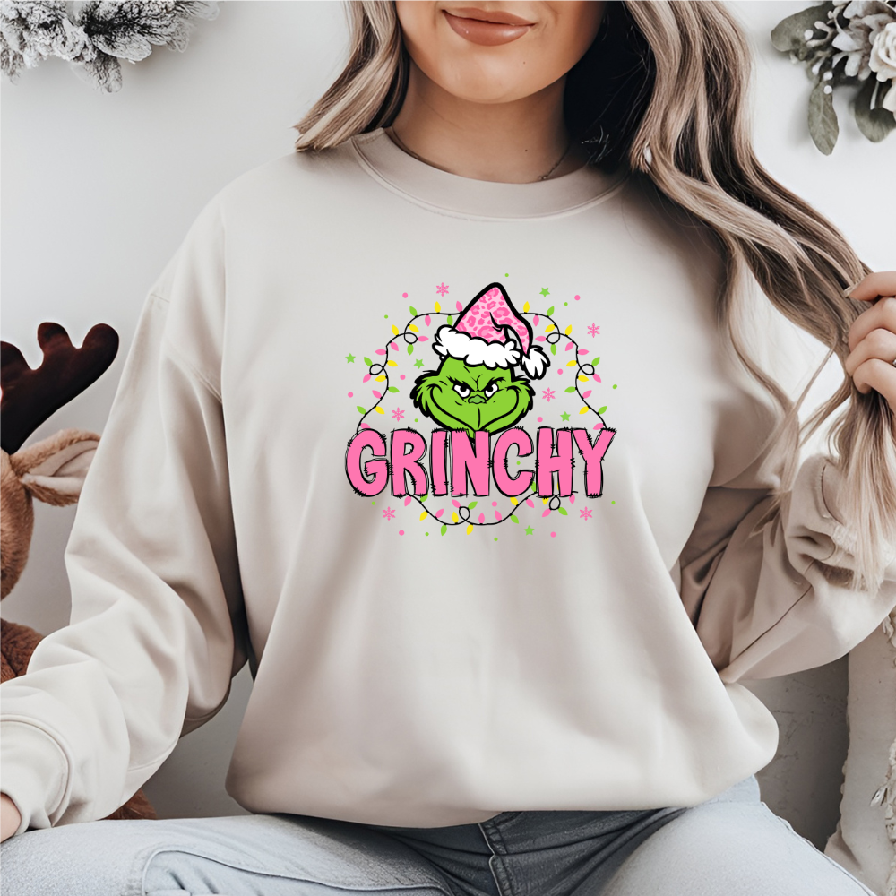 beige grinchy sweater with christmas lights